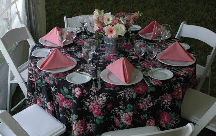 Pink place setting on wedding table